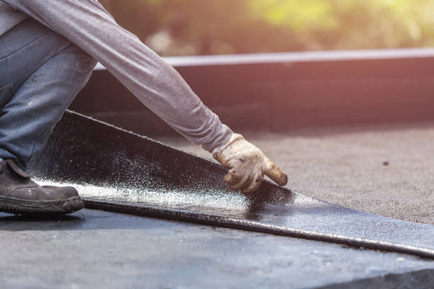 Professional Emergency Waterproofing technician working in Weston, MO